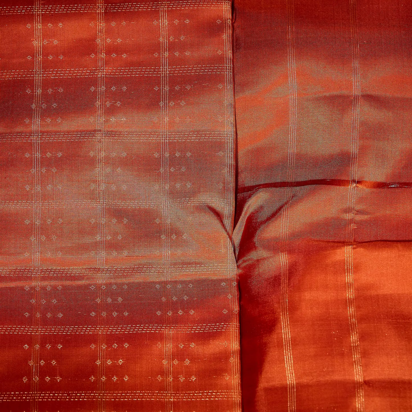 Aarunya burnt orange Kanchivaram silk saree with gold zari geometric patterns and elegant tassels – festive saree UAE