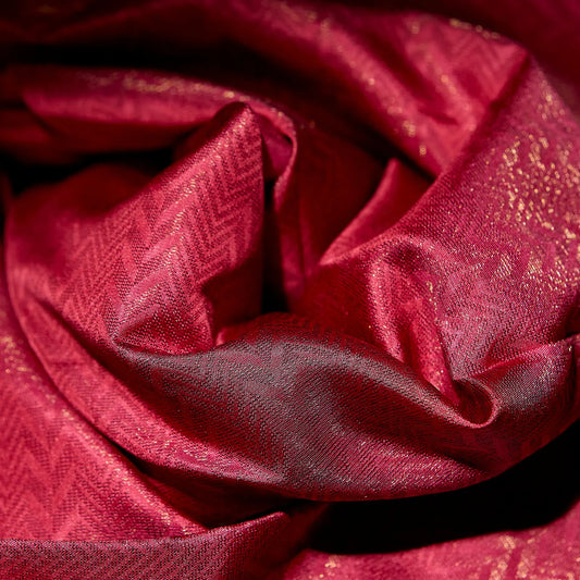 Roshivya deep rose pink Kanchivaram silk saree with chevron weave texture and subtle gold zari detailing – festive saree UAE