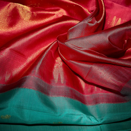 Mehera aqua blue Kanchivaram silk saree with rani pink contrast pallu and gold zari motifs – Ethereal Weaves UAE.