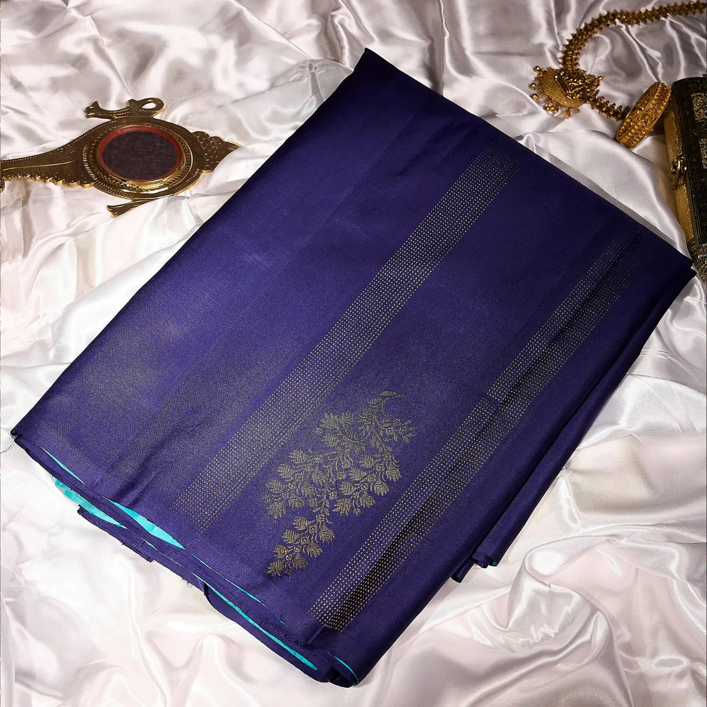 Neelvastra royal and sea blue Kanchivaram silk saree with antique gold zari floral border – Ethereal Weaves UAE