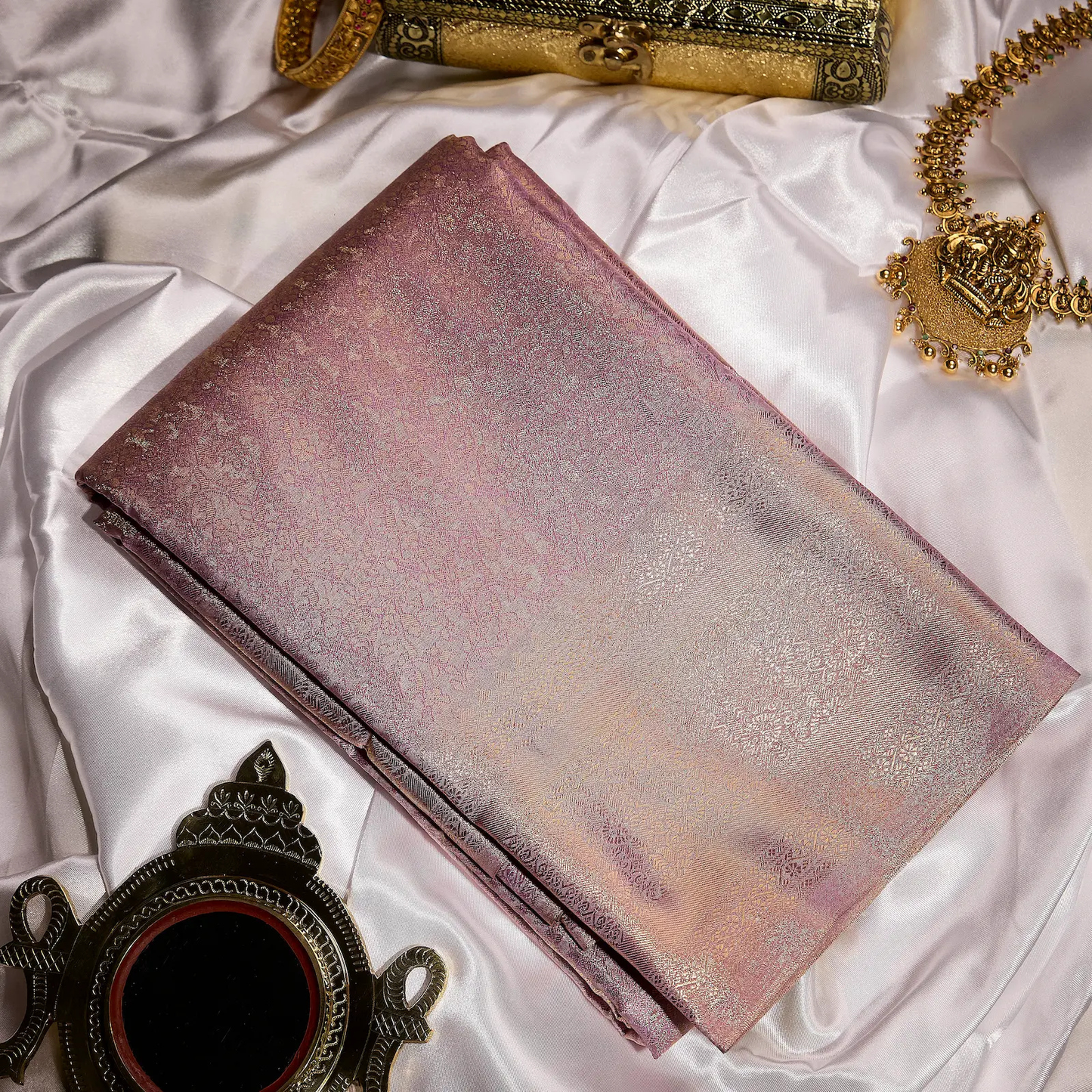 Mrunalini blush mauve Kanchivaram silk saree with delicate antique gold zari floral motifs – wedding saree UAE