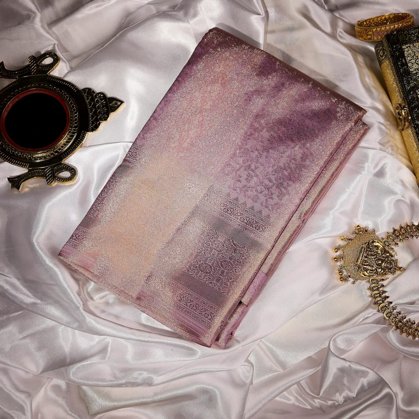 Mrunalini blush mauve Kanchivaram silk saree with delicate antique gold zari floral motifs – wedding saree UAE