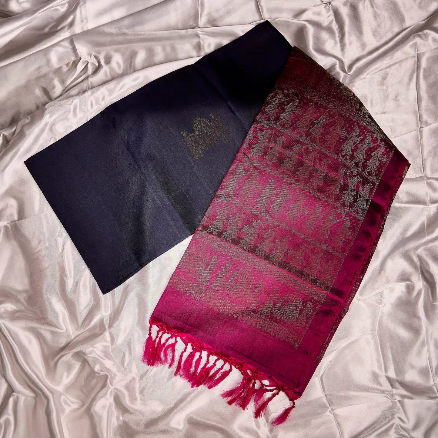 Paalki black and rani pink Kanchivaram silk saree with palanquin-inspired antique gold zari motifs and tassel detailing – bridal saree UAE