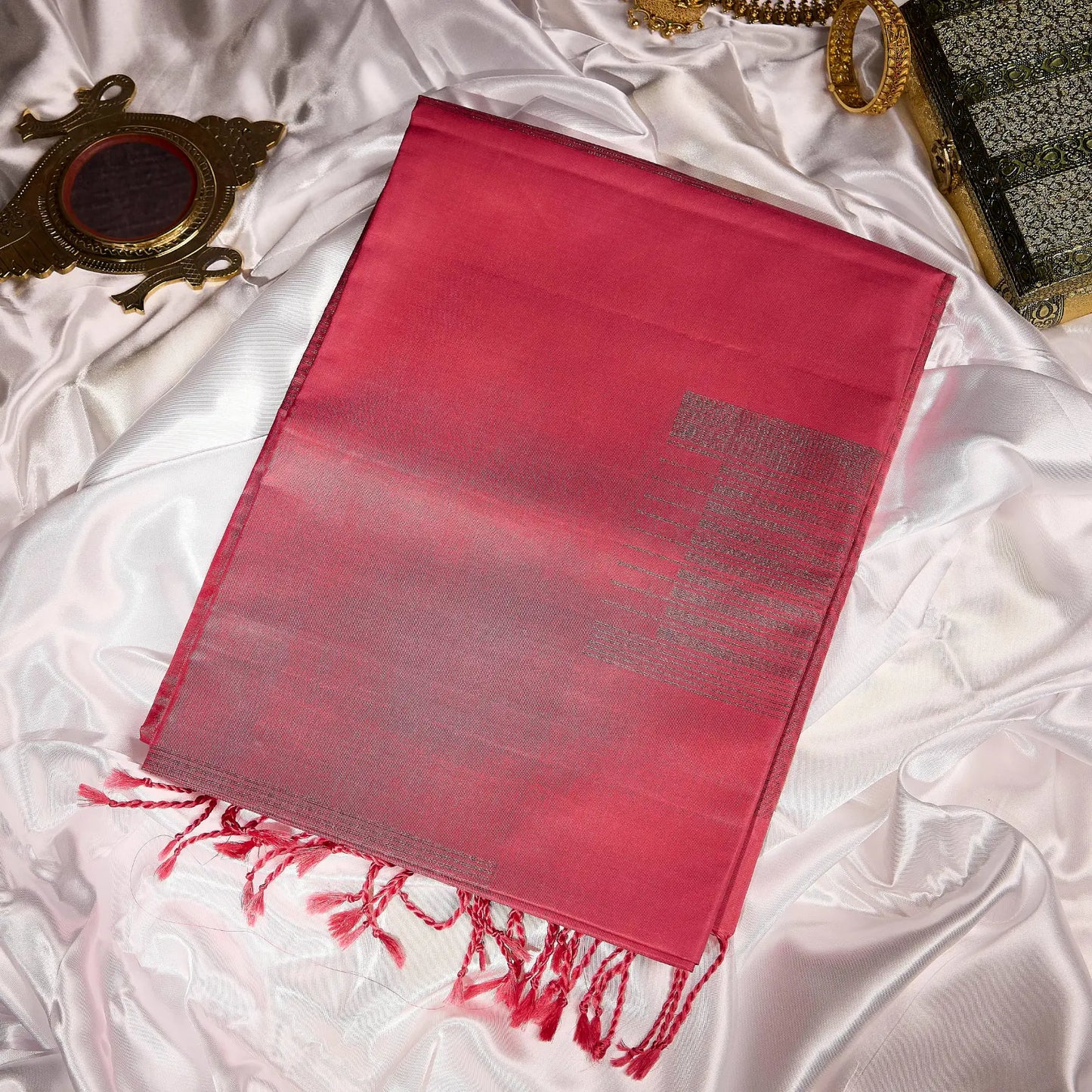 Roshivya deep rose pink Kanchivaram silk saree with chevron weave texture and subtle gold zari detailing – festive saree UAE