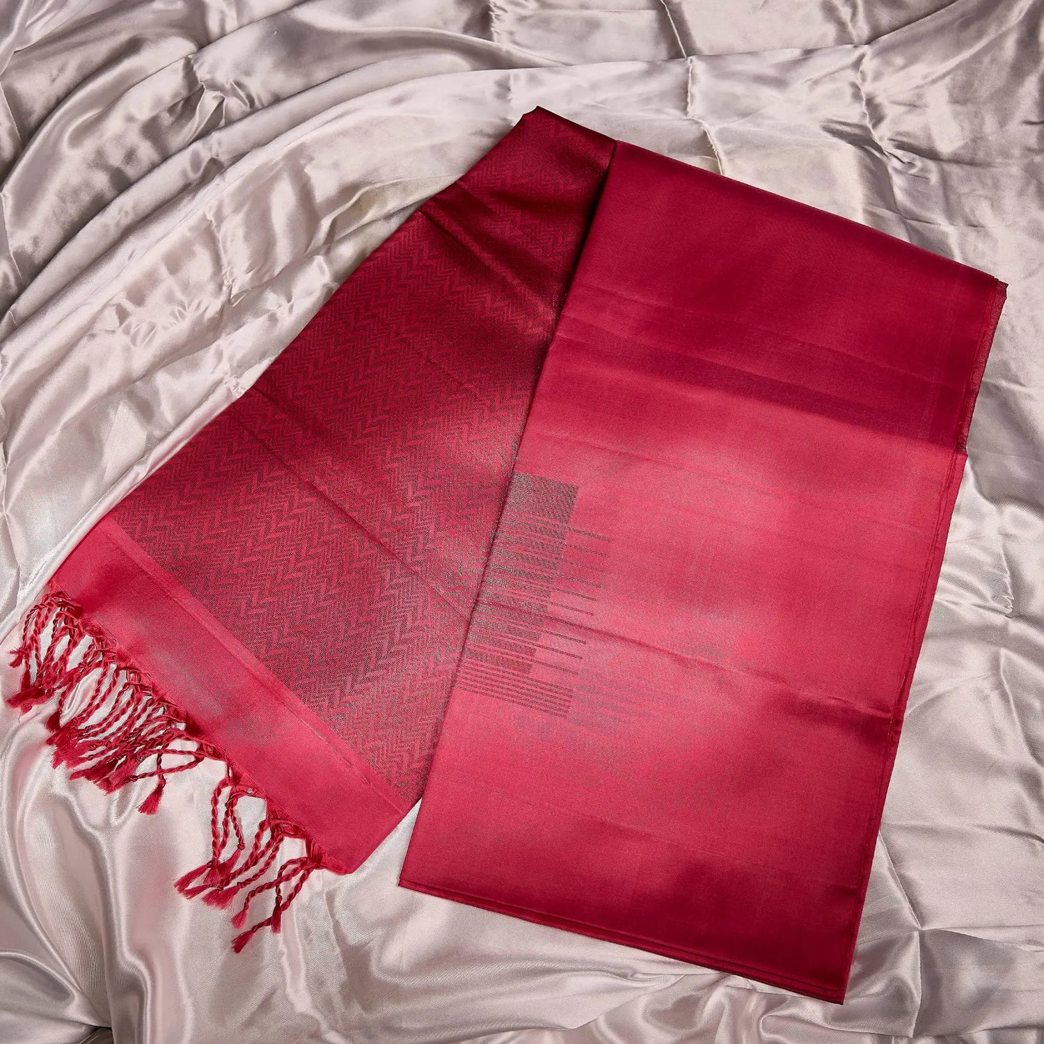 Roshivya deep rose pink Kanchivaram silk saree with chevron weave texture and subtle gold zari detailing – festive saree UAE