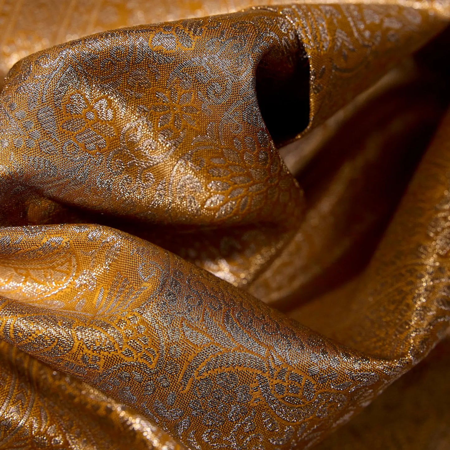 Svarnika mustard gold Kanchivaram silk saree with intricate floral zari weaving – bridal saree UAE