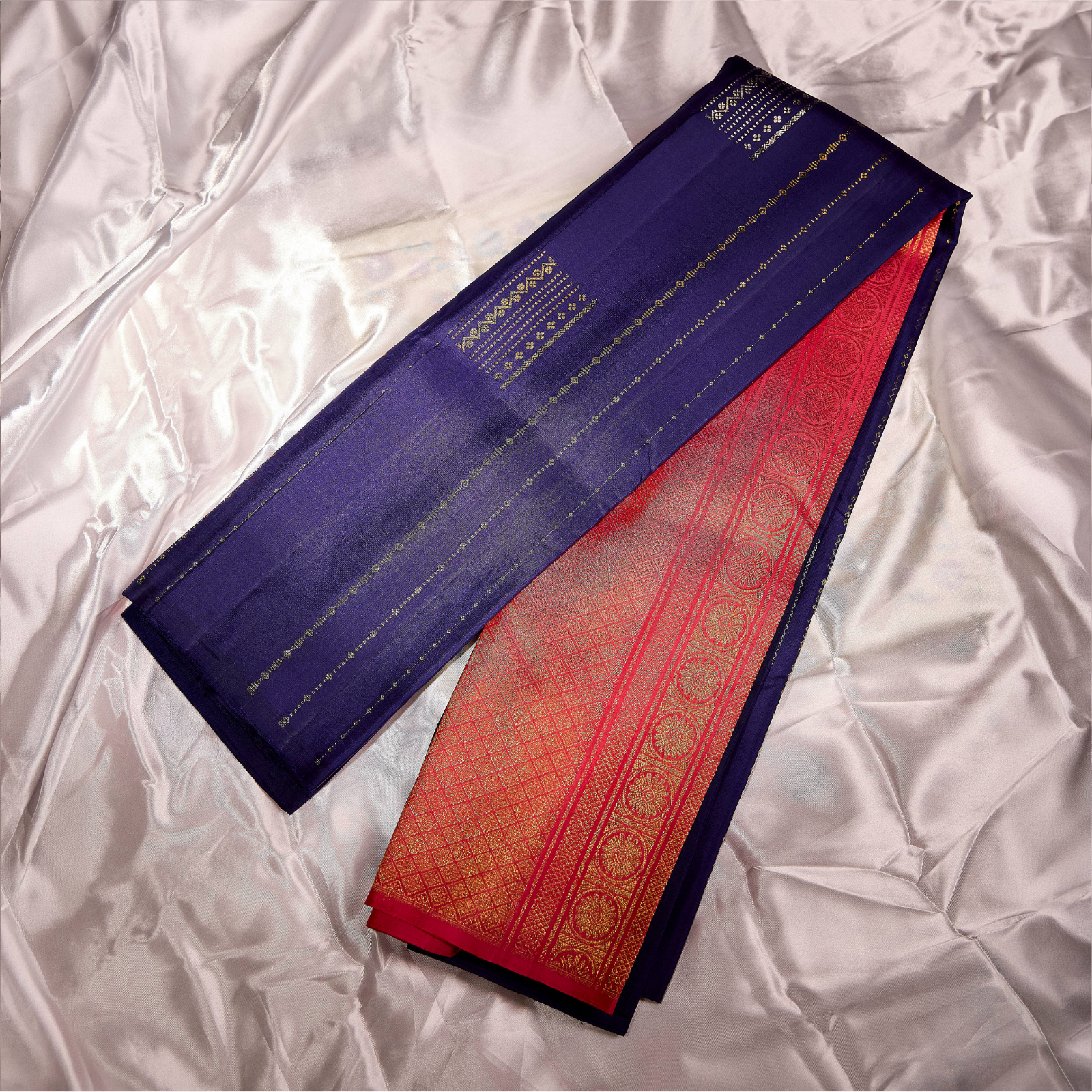 Indira Raga indigo blue and rani pink Kanchivaram silk saree with fine geometric zari motifs and richly patterned pallu – bridal saree UAE