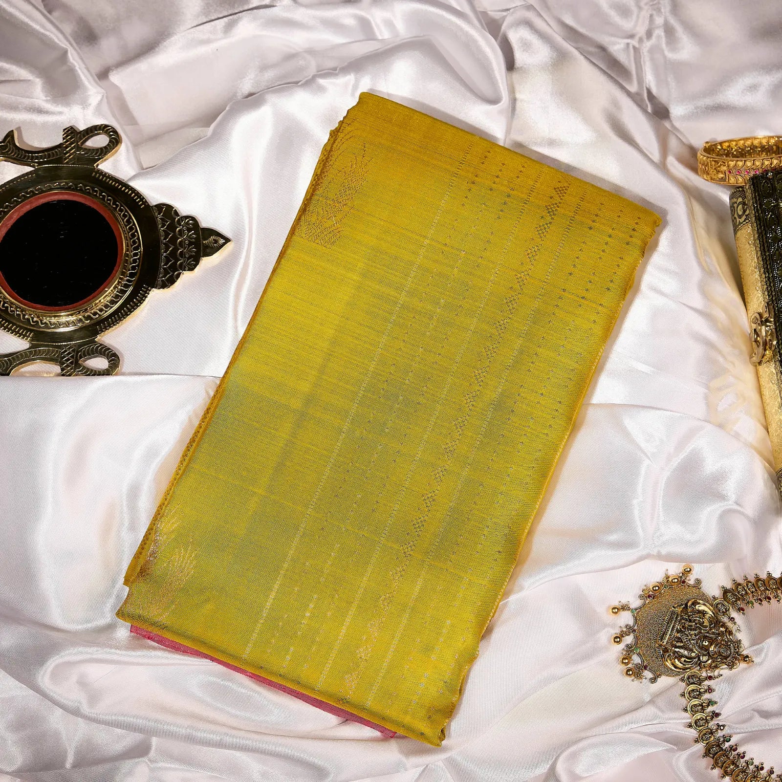 Kanaka Rani mustard gold and ruby pink Kanchivaram silk saree with fine zari motifs and contrast pallu – Ethereal Weaves UAE
 