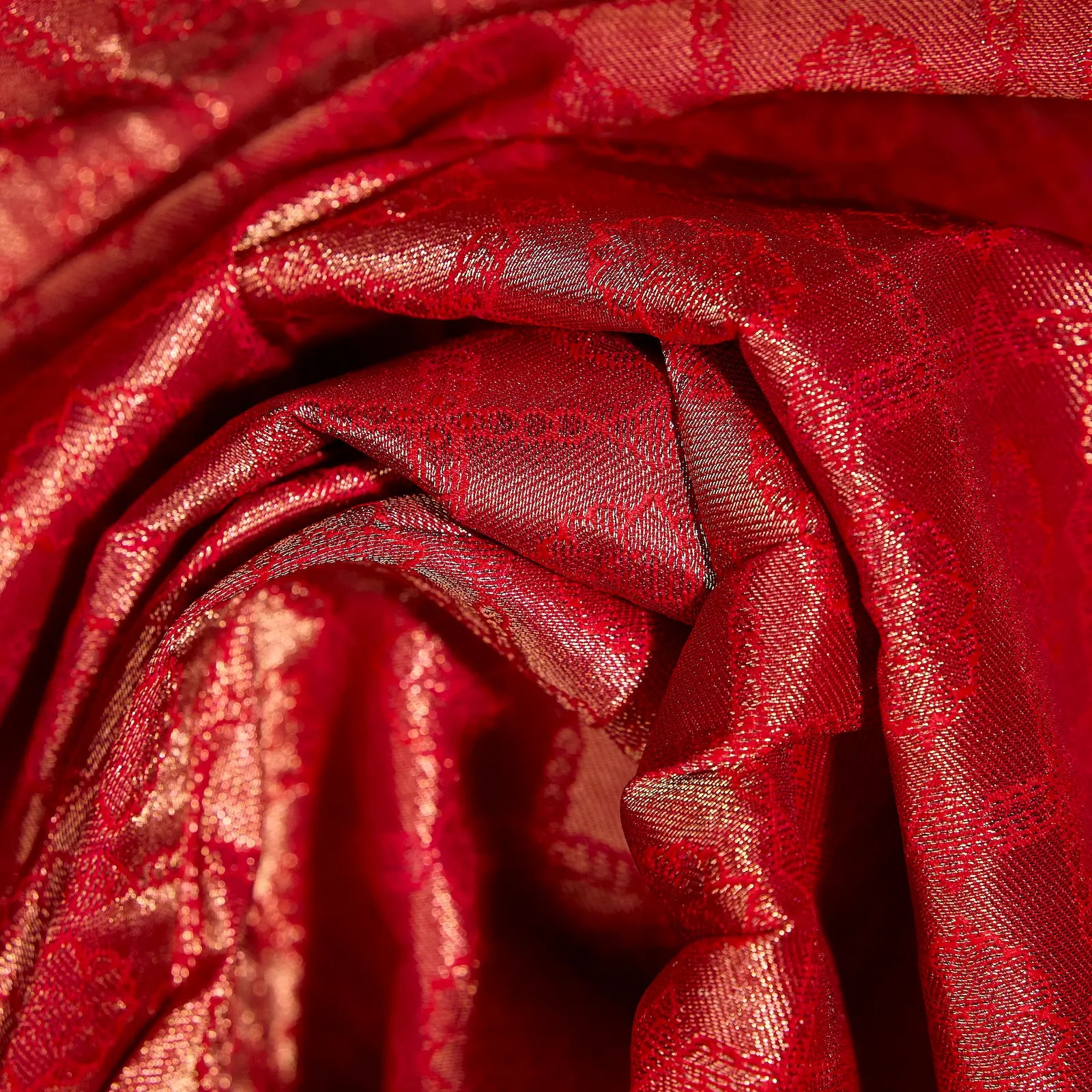 Kesari Varnika amber gold and rani pink Kanchivaram silk saree with floral zari motifs and tassel accents – festive saree UAE