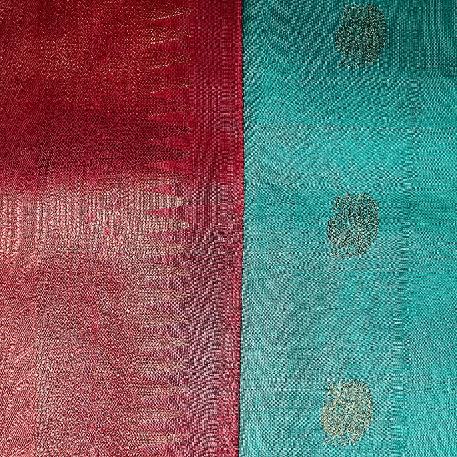 Mehera aqua blue Kanchivaram silk saree with rani pink contrast pallu and gold zari motifs – Ethereal Weaves UAE.