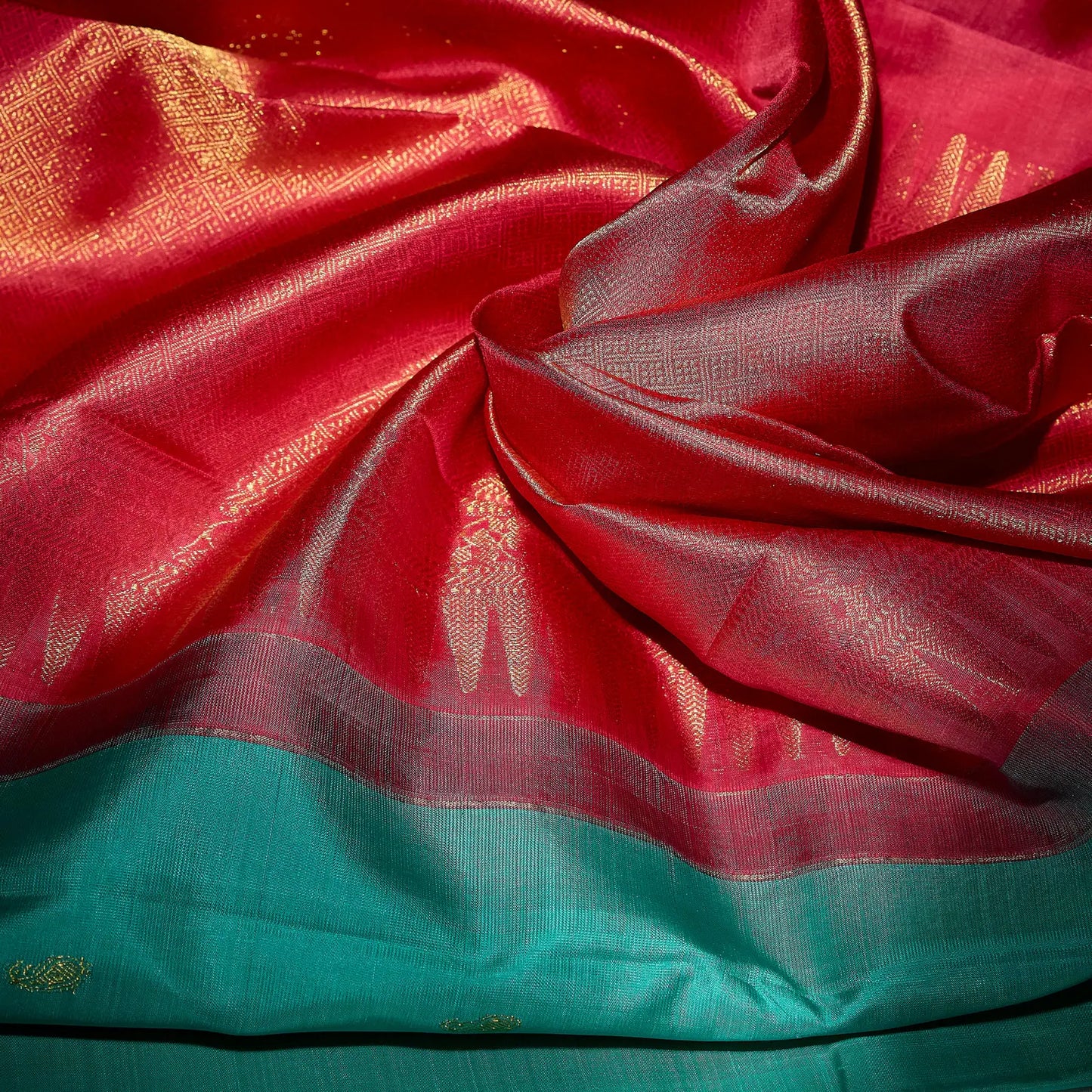 Mehera aqua blue Kanchivaram silk saree with rani pink contrast pallu and gold zari motifs – Ethereal Weaves UAE.