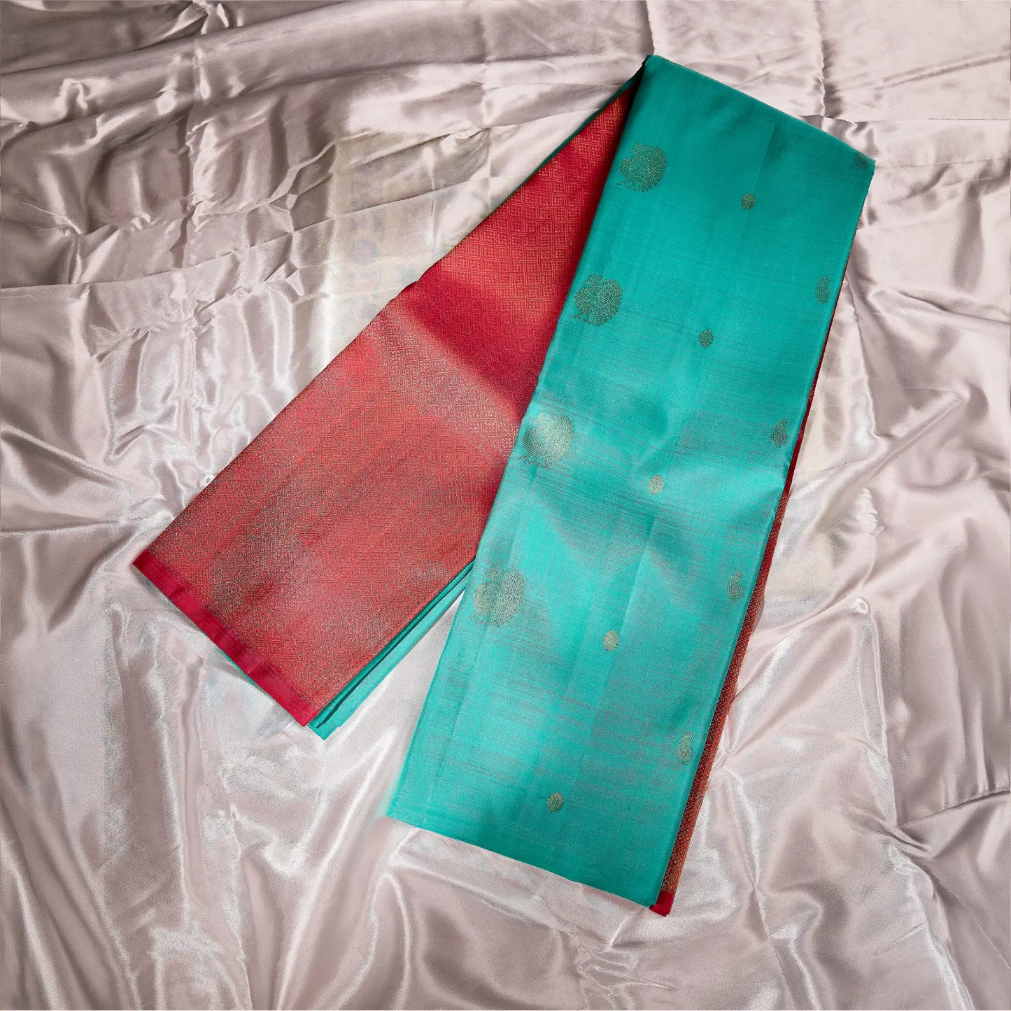 Mehera aqua blue Kanchivaram silk saree with rani pink contrast pallu and gold zari motifs – Ethereal Weaves UAE.