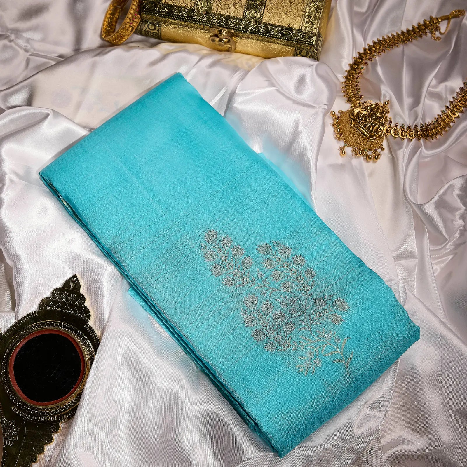 Neelambari Veda aqua blue Kanchivaram silk saree with elegant silver floral zari motifs and soft lustrous sheen – festive saree UAE
