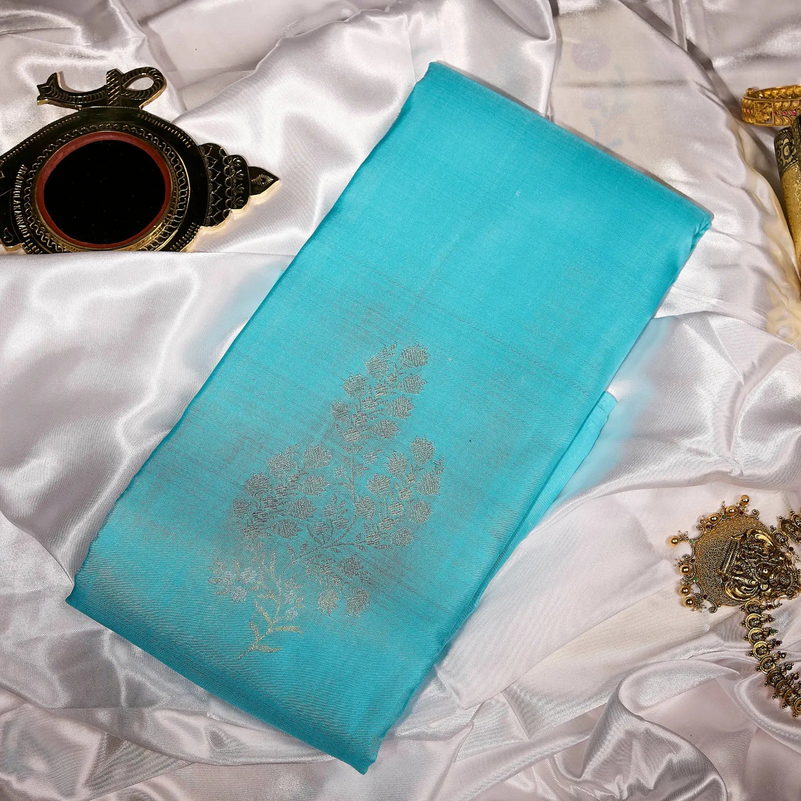 Neelambari Veda aqua blue Kanchivaram silk saree with elegant silver floral zari motifs and soft lustrous sheen – festive saree UAE