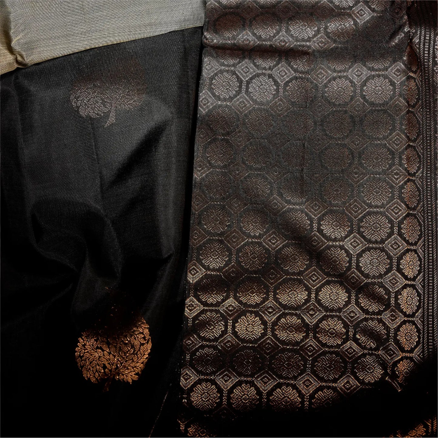 Noir Vasantham classic black Kanchivaram silk saree with antique gold zari geometric border and leaf motif pallu – Ethereal Weaves UAE
