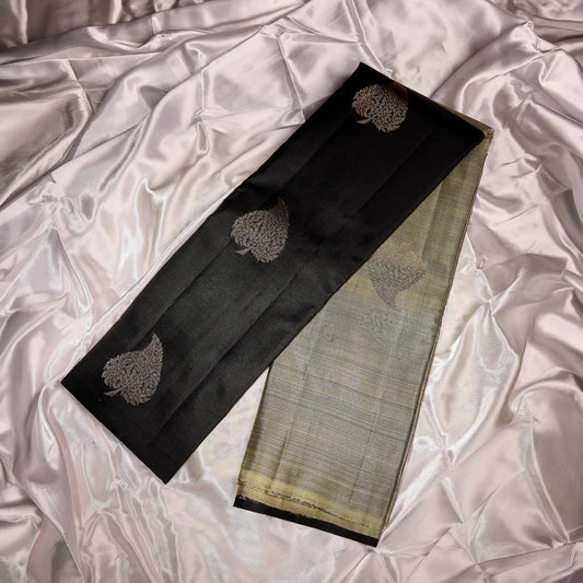 Noir Vasantham classic black Kanchivaram silk saree with antique gold zari geometric border and leaf motif pallu – Ethereal Weaves UAE
