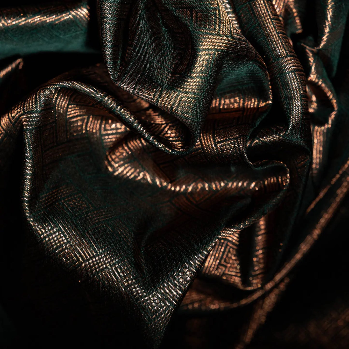 Pehrika peach Kanchivaram silk saree with gold zari stripes and copper-tinted bottle green contrast pallu – festive saree UAE